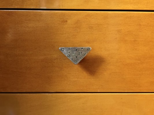 Custom Made Door Handles - These custom made kitchen door handles were made of white metal. They have a matching triangle drawer pull to add more visual symmetry. They have a distressed look and two-toned feature with black poker dots. Custom Made Door Handles - These custom made kitchen door handles were made of white metal. They have a matching triangle drawer pull to add more visual symmetry. They have a distressed look and two-toned feature with black poker dots.
