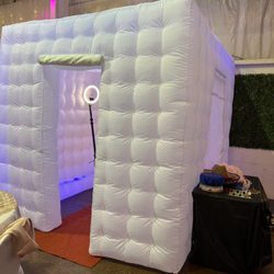 Partylux - Photobooth setup with all the props needed for all of your events! The pricing includes the inflatable tent and props!