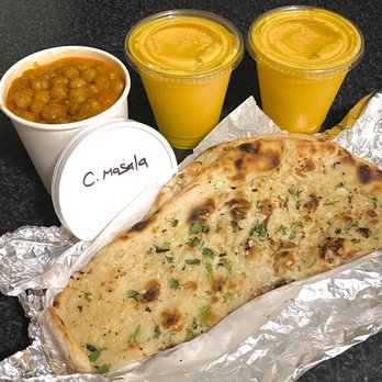 Bawarchi Biryani's - Chana Masala vegan GF, Butter Garlic Naan, Mango Lassi - Indian Near Me - Brandon, Florida
