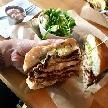 Hand And Foot - Inside view of the Buttermilk Fried Chicken Sandwich with Greens ($1 extra). Delicious! - Bars Near Me - Corning, New York