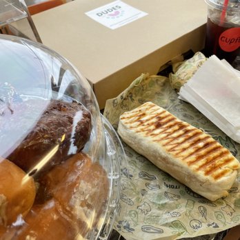 Cupful - a variety of donuts and pastries on a table - Coffee & Tea Near Me - Bremerton, Washington