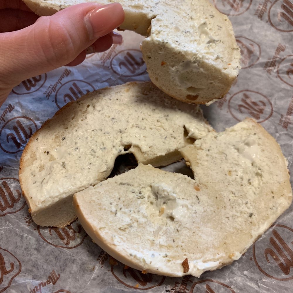 Manhattan Bagel - $4 dollar onion bagel with a drop of garlic and herb cream cheese. - Bagels Near Me - Westfield, New Jersey Manhattan Bagel - $4 dollar onion bagel with a drop of garlic and herb cream cheese. - Bagels Near Me - Westfield, New Jersey