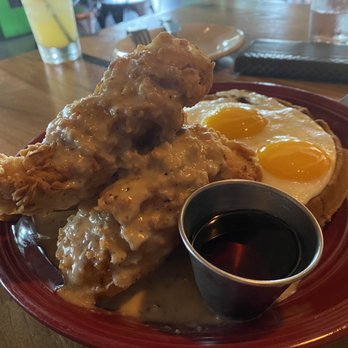 Whiskey Cake Kitchen Bar - Chicken & Waffles.... Ask for extra gravy (a rich complement to the bacon speckled waffle! - American Near Me - Oak Ridge North, Texas Whiskey Cake Kitchen Bar - Chicken & Waffles.... Ask for extra gravy (a rich complement to the bacon speckled waffle! - American Near Me - Oak Ridge North, Texas