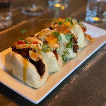 Gather in Jackson Hole - PORK BUNS  (LOCAL FAVORITE) 
Fresh Housemade Bao Bun, Crispy Braised Pork Belly, Kimchi, Fresno Chiles - New American Near Me - Jackson, Wyoming