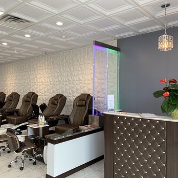 Lucky Nails & Spa - The reception area and one side of the pedicure area. The massage chairs are awesome. - Nail Salons Near Me - Louisville, Colorado