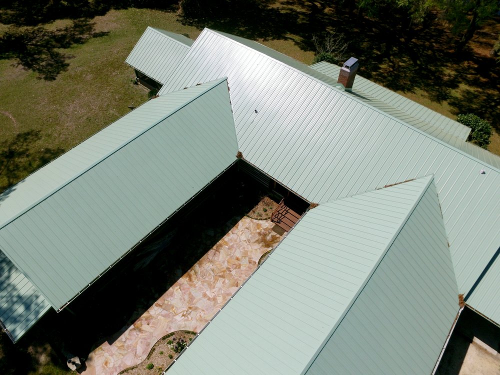 Slide of TMT Roofing