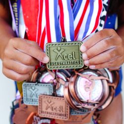 Katy Kips Gymnastics Club - Texas State Champion on bars for Katy Kips!