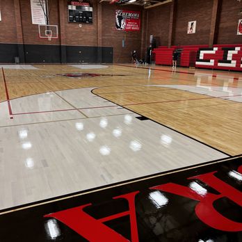 Wisewoodworks & Design - a basketball court with red and black markings - Flooring Near Me Wisewoodworks & Design - a basketball court with red and black markings - Flooring Near Me