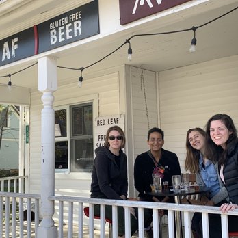 Red Leaf Gluten-Free Brewing - three women sitting on a porch - Breweries Near Me - Jeffersonville, Vermont Red Leaf Gluten-Free Brewing - three women sitting on a porch - Breweries Near Me - Jeffersonville, Vermont