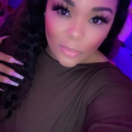A middle part sew-in with two 22" wavy Meshella Rose bundles w/ highlights A middle part sew-in with two 22" wavy Meshella Rose bundles w/ highlights