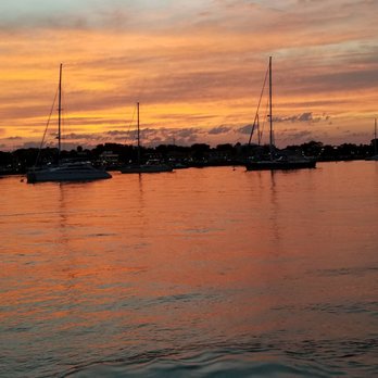 Red Boat Water Tours - Sunset in the harbor - Boat Tours Near Me - Saint Augustine, Florida Red Boat Water Tours - Sunset in the harbor - Boat Tours Near Me - Saint Augustine, Florida