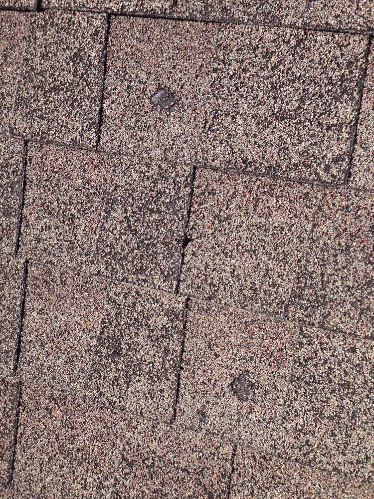 Slide of Schick Roofing