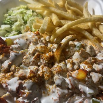 Smokey Chick - a plate of food with fries and coleslaw - Chicken Wings Near Me - New York, New York Smokey Chick - a plate of food with fries and coleslaw - Chicken Wings Near Me - New York, New York
