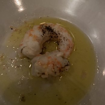 Coquette - Poached shrimp in EVO and salt. Yummy - New American Near Me - New Orleans, Louisiana