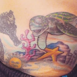 Crossbones Tattoo & Piercings
