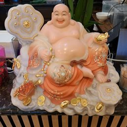 Happy Buddha with creamy peach skin Happy Buddha with creamy peach skin