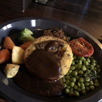 Leaky Cauldron™ - Toad in the Hole - British Near Me - Orlando, Florida Leaky Cauldron™ - Toad in the Hole - British Near Me - Orlando, Florida