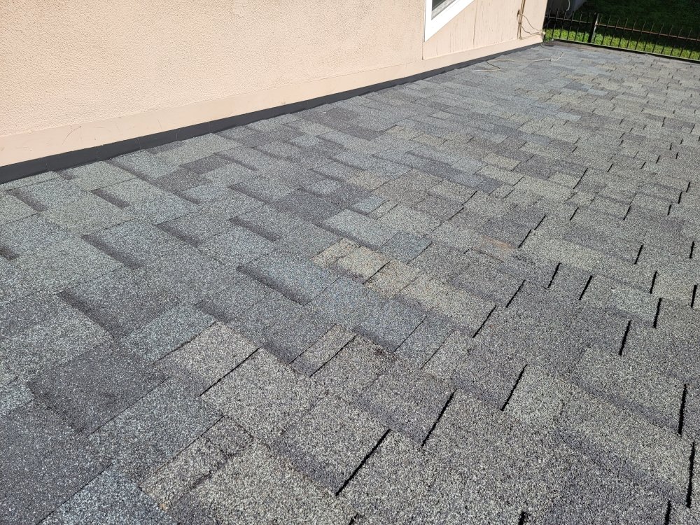 Slide of Blue Lake Roofing