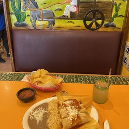 3 tamales, rice, and beans. 3 tamales, rice, and beans.