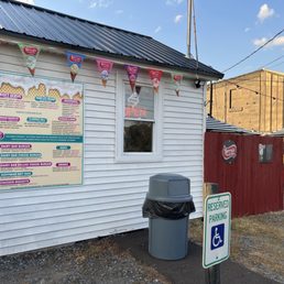 Outside the dairy bar (you can see some outdoor seating behind the fence too) Outside the dairy bar (you can see some outdoor seating behind the fence too)