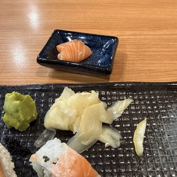 Oishii - The amount of fish on the roll- and the piece the waitress gave me to improve the situation. - Sushi Bars Near Me - Santa Rosa, California