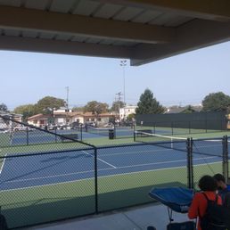 Six resurfaced and repainted tennis courts with lights for night play