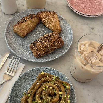 K'Far Cafe - Pistachio sticky bun, iced chai, and borekasim trio - Cafes Near Me - Philadelphia, Pennsylvania