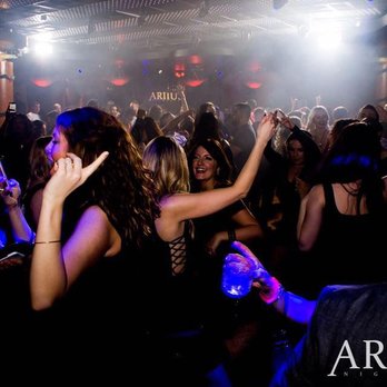 Ariius Nightclub - a group of people dancing at a party - Dance Clubs Near Me - Windsor, Ontario