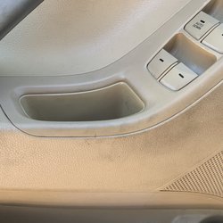 Mavis Discount Tire - Grease stains on driver door panel