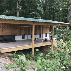 Jc's Purrfect Pooch Parlor - Kennel runs overlooking the horse pasture and pet yard.