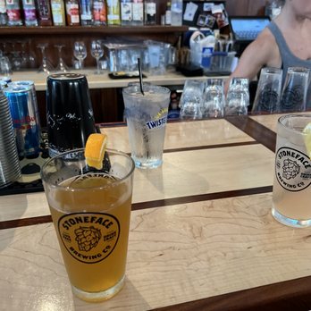 TJs - two glasses of beer on a bar - Sports Bars Near Me - Portsmouth, New Hampshire TJs - two glasses of beer on a bar - Sports Bars Near Me - Portsmouth, New Hampshire