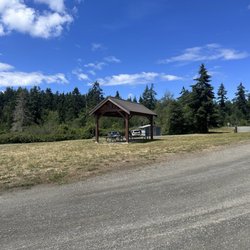Mystery Bay County Park - Picnic tables with bathroom in the background
