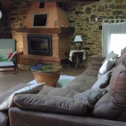 Apartamentos Naturaleza - Salón con chimenea