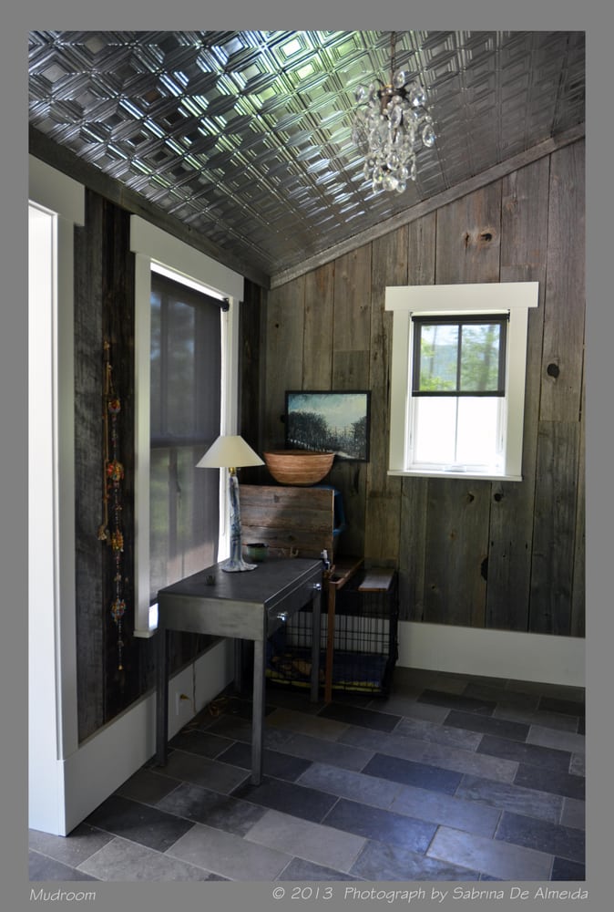 The Walls Of The Mud Room Are Of Weathered Barn Wood The Tin