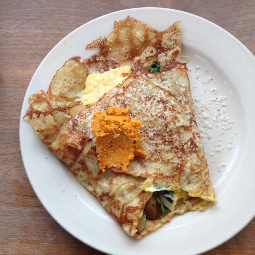 Bradbury's - Potato, spinach, egg, Parmesan crepe with carrot cashew pate. - Coffee & Tea Near Me - Madison, Wisconsin Bradbury's - Potato, spinach, egg, Parmesan crepe with carrot cashew pate. - Coffee & Tea Near Me - Madison, Wisconsin