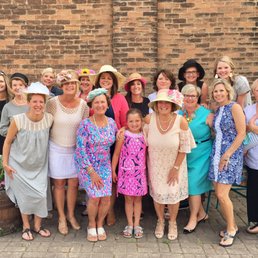 a large group of women posing for a picture a large group of women posing for a picture