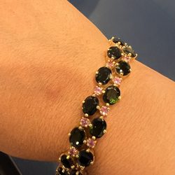 Prim Jewelers - 18kt gold bracelet set with green tourmaline and pink sapphire