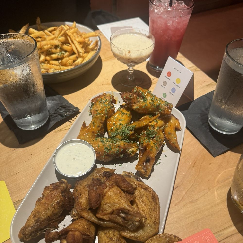 Cibus Chophouse - 2 pound wings, Jamaican jerk and Thai sauce, wings with dipping sauce - American Near Me - Hampton, Virginia