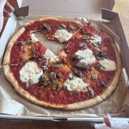 More pizza sauce then cheese More pizza sauce then cheese