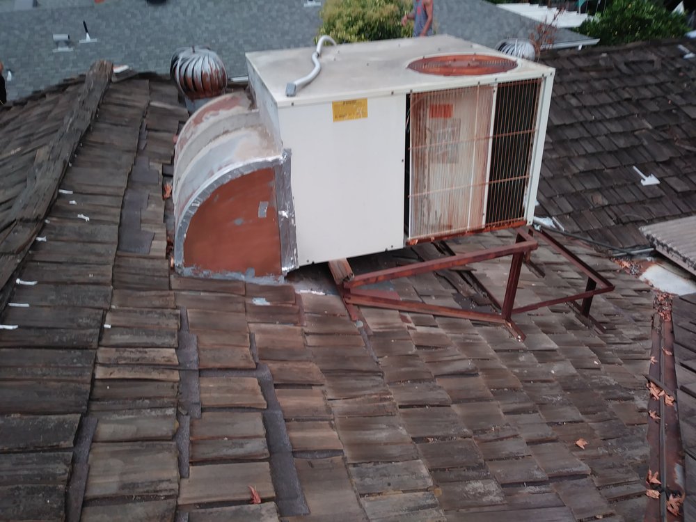 Slide of NL Roofing