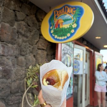 Puka Dog - polish sausage with mild garlic lemon secret sauce, Kauai special mango relish, and lilikoi hawaiian mustard - Hot Dogs Near Me - Koloa, Hawaii Puka Dog - polish sausage with mild garlic lemon secret sauce, Kauai special mango relish, and lilikoi hawaiian mustard - Hot Dogs Near Me - Koloa, Hawaii