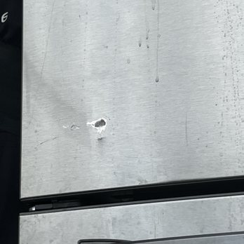Make Your Move Colorado - $1,600 fridge has huge deep chunk taken out of it - Movers Near Me Make Your Move Colorado - $1,600 fridge has huge deep chunk taken out of it - Movers Near Me