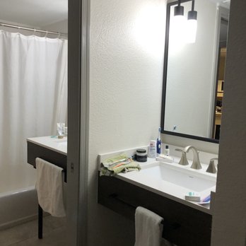 Windmill Suites Surprise, Ascend Hotel Collection - Double sinks, one inside the bathroom and one just outside the bathroom. - Hotels Near Me - Surprise, Arizona Windmill Suites Surprise, Ascend Hotel Collection - Double sinks, one inside the bathroom and one just outside the bathroom. - Hotels Near Me - Surprise, Arizona