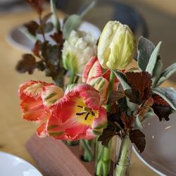 Apple Core Farm & Cut Flowers - A few perfect tulip blooms transform a table for this wedding rehearsal dinner.