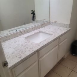 As they were putting on countertop in bathroom.