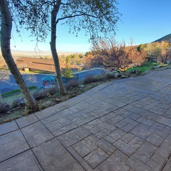 Complete Construction - They poured a new back patio. With stained and stamped concrete - General Contractors Near Me - Bluffdale, Utah Complete Construction - They poured a new back patio. With stained and stamped concrete - General Contractors Near Me - Bluffdale, Utah