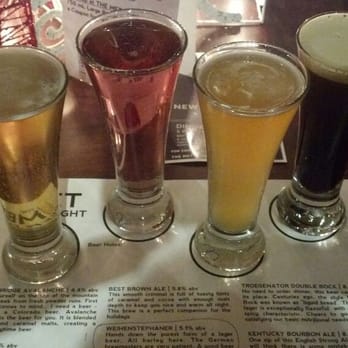 The Met - Beer flight of (from left) lager, berry cider, amber ale and milk stout - Wine Bars Near Me - Lima, Ohio