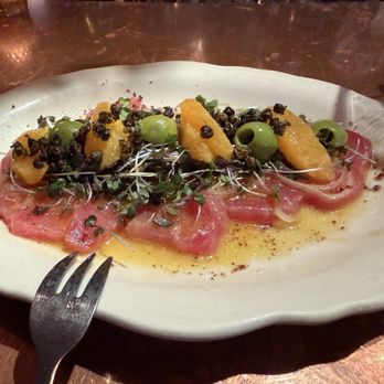 The Pink Door - House Smoked Ahi Tuna Carpaccio - Italian Near Me - Seattle, Washington The Pink Door - House Smoked Ahi Tuna Carpaccio - Italian Near Me - Seattle, Washington