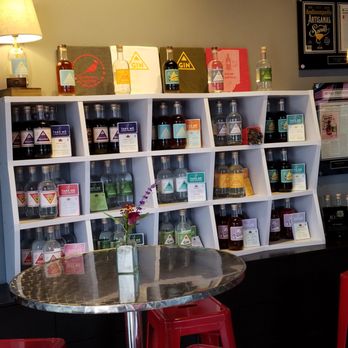 Cardinal Spirits - spirit rack - Cocktail Bars Near Me - Bloomington, Indiana