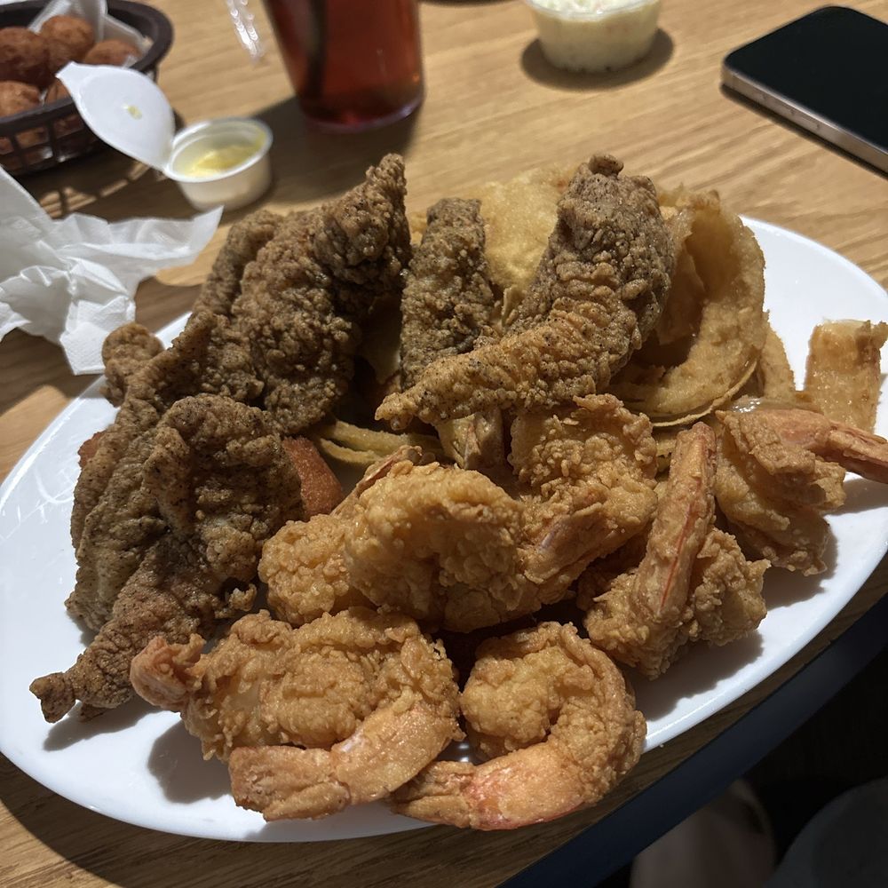 Captain Steve's - pick two combo with the catfish strips and the jumbo shrimp with side of onion rings - Seafood Near Me - Harrisburg, North Carolina Captain Steve's - pick two combo with the catfish strips and the jumbo shrimp with side of onion rings - Seafood Near Me - Harrisburg, North Carolina